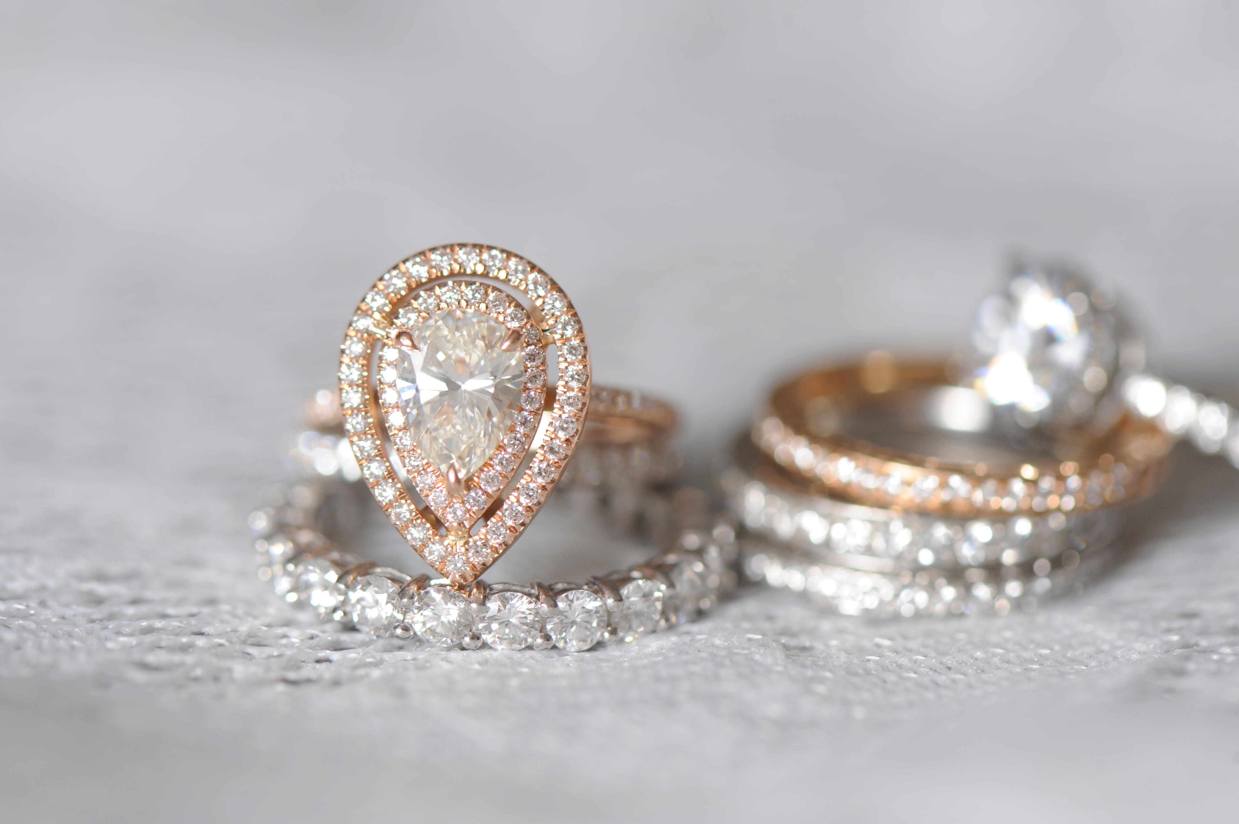 Pear double halo diamond ring and Wedding bands