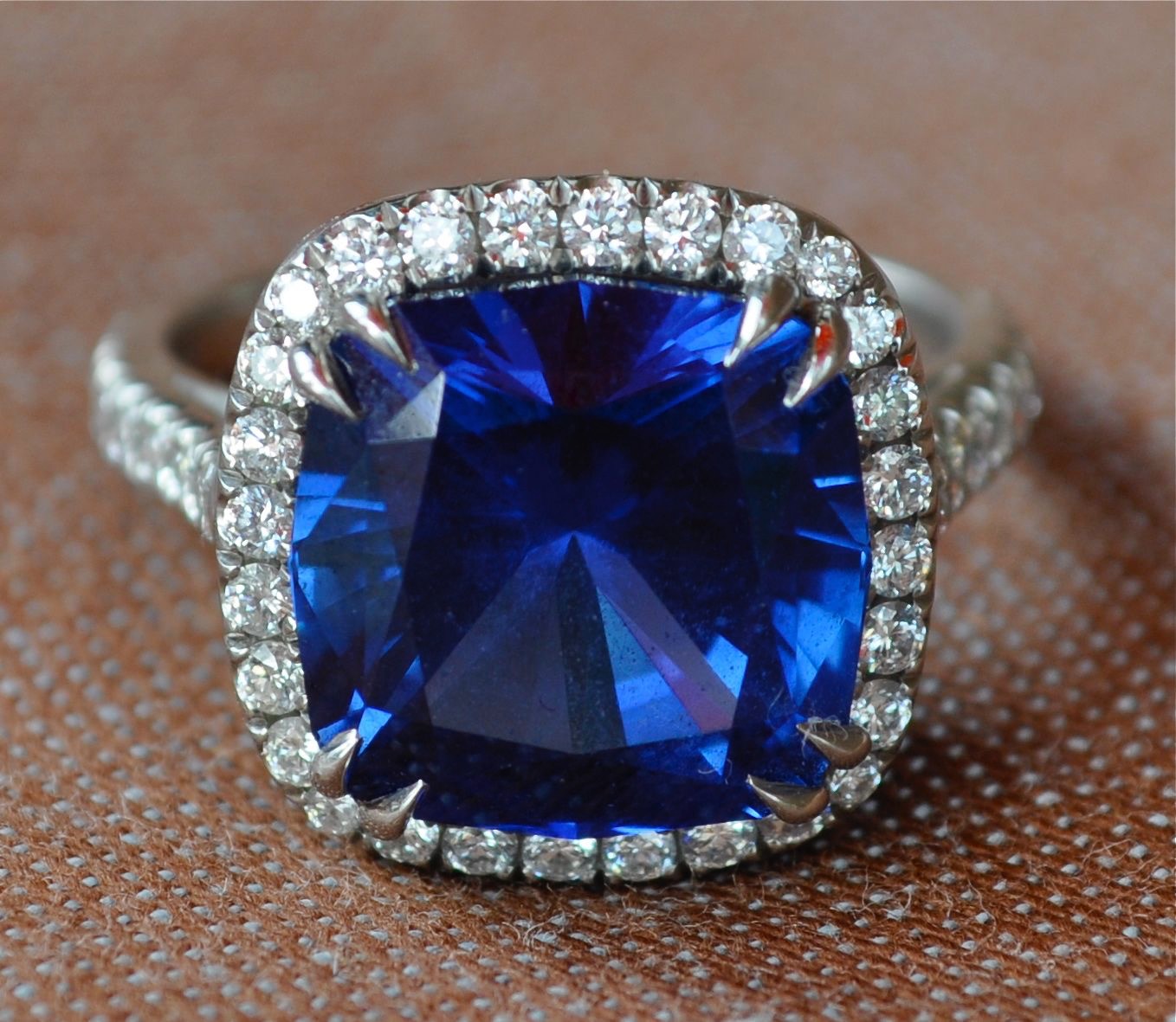 Sapphire and diamond halo engagement