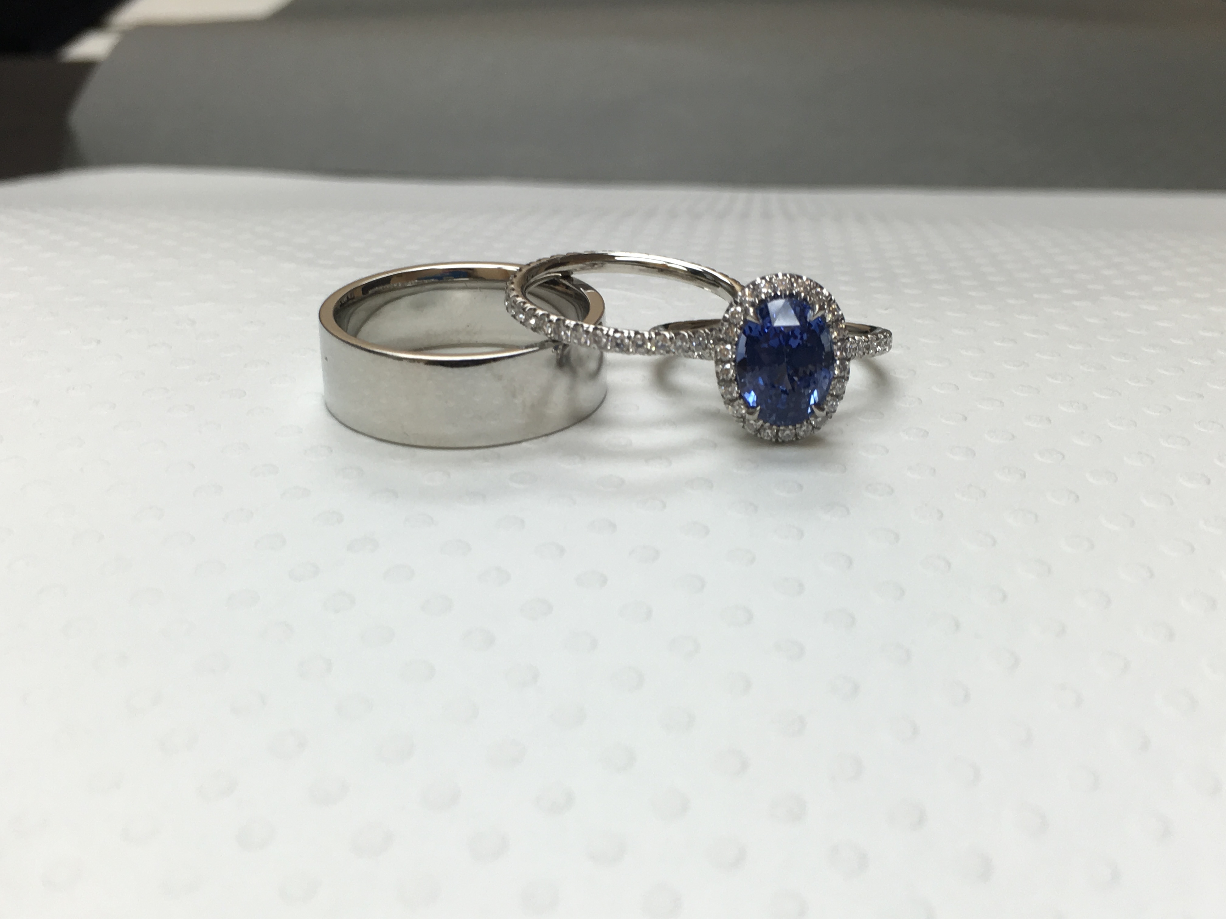 sapphire halo engagement ring and wedding rings
