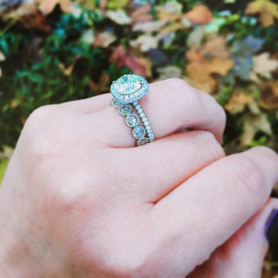 Halo engagement ring with rose cut diamond wedding band